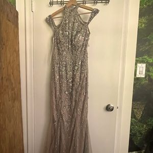 Gorgeous gown never worn - original price $600 selling for $250 Size S/M
